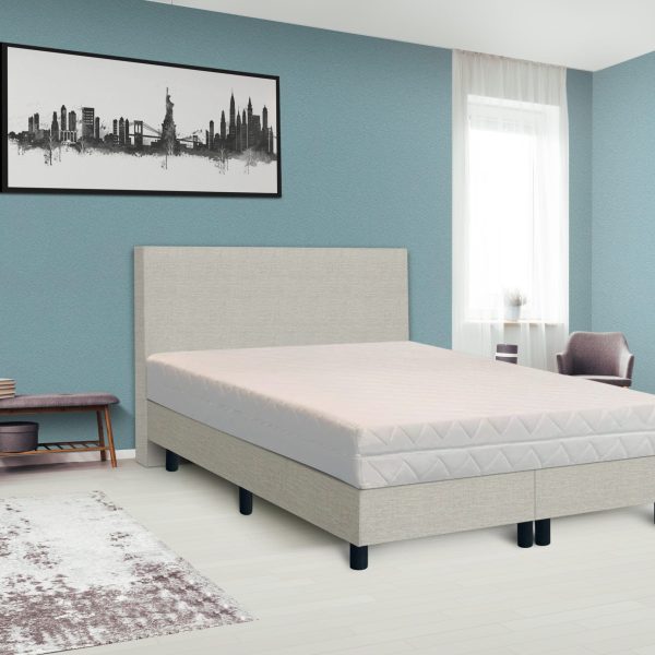 Dark poster on the wall with copy space in bright bedroom interior with bench, grey chair and patterned carpet