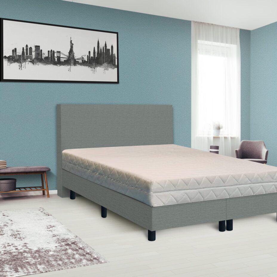 Dark poster on the wall with copy space in bright bedroom interior with bench, grey chair and patterned carpet